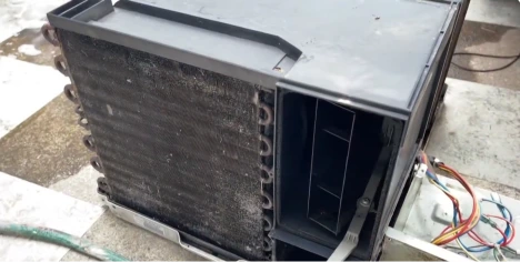 Dirty evaporator coil before professional cleaning