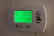 Thermostat inspection — checking settings before AC diagnosis