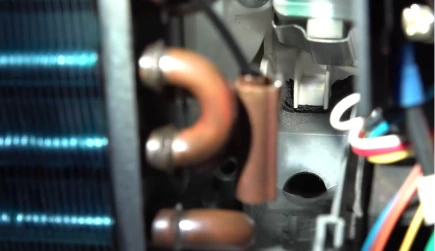 Copper refrigerant lines — checked for leaks on every diagnostic
