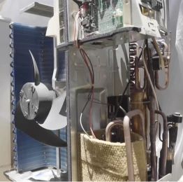 Internal AC components exposed during repair